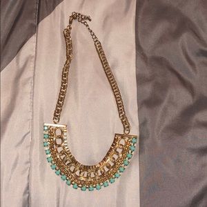 Bulky gold and blue necklace